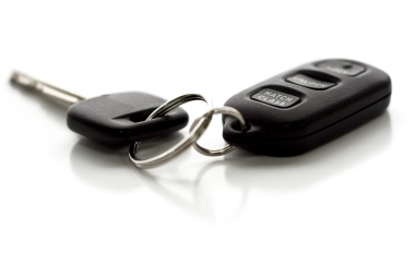 Learn to drive with Sharon Sidaway's School of Motoring Photograph of car key and remote on a white background